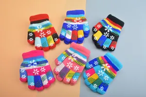 Kids winter five-finger knit gloves with colorful stripes and cute snowflake patterns.