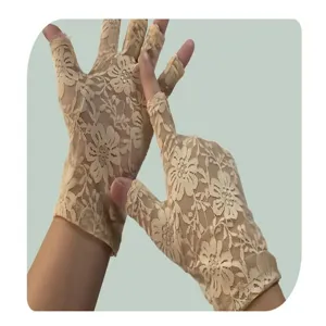 Close-up view of elegant beige floral lace fingerless gloves, breathable summer sun protection.