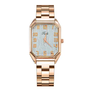 Elegante orologio da donna al quarzo rettangolare con cinturino in acciaio oro rosa e quadrante.