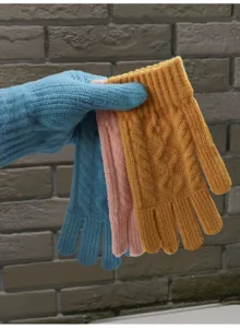 Knit gloves detail view, showcasing warm wool texture and colorful knitted options.
