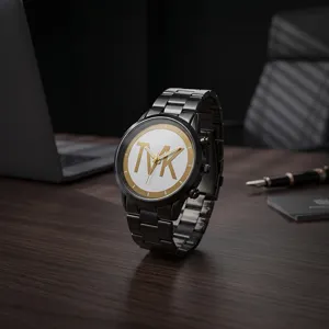 Detail shot of a sleek black quartz men's watch featuring a bold white dial and gold TVK logo.