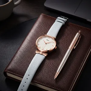 Orologio al quarzo donna cinturino pelle azzurro cassa oro rosa quadrante girasole fiocco