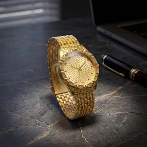 Close-up of luxury gold quartz watch with crystal paved dial and stainless steel band.