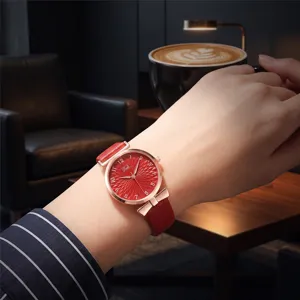 Orologio da donna al quarzo elegante con quadrante rosso, cinturino in pelle e fiocco.