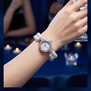 Exquisite rhinestone pearl quartz watch detail, elegant fashion women's bracelet watch.