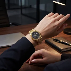 Gold quartz watch for women with sparkling rhinestone dial and elegant metal alloy strap.