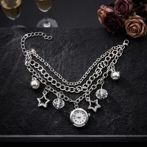 Multi-layer silver chain quartz bracelet watch with star and crystal charms for women.