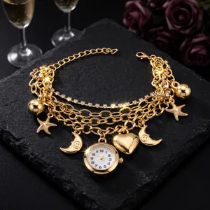 Gold multi-layer charm bracelet quartz watch with heart star moon pendants for women stylish.