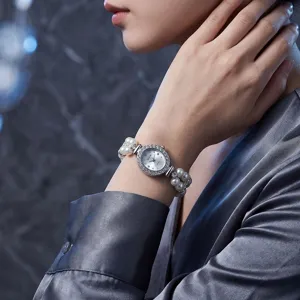 Women quartz watch with faux pearl elastic bracelet and rhinestone bezel elegant timepiece