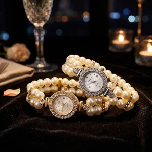 Close-up detail shot of double-row pearl elastic quartz watches with sparkling rhinestone bezels.