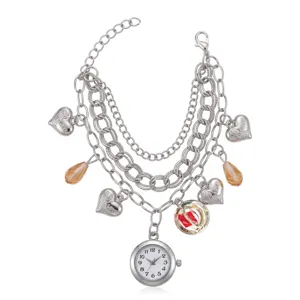 Women multi-layer chain charm bracelet watch with heart pendants and quartz dial, silver finish.