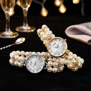 Elegant double-row pearl elastic quartz watch with sparkling rhinestones for women stylish jewelry.