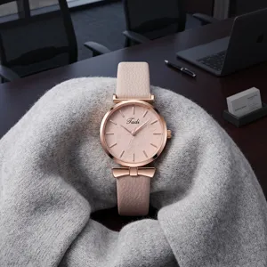 Women quartz watch pink leather strap bow detail leaf embossed dial elegant time