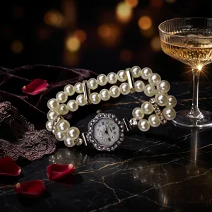 Elegant double-row pearl stretch quartz watch with floral rhinestone dial detail view.