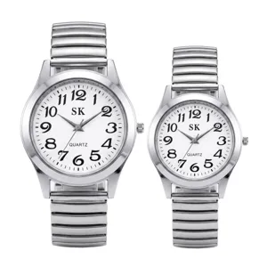 Silver quartz watch with expansion stretch band and clear large numbers dial for daily wear.