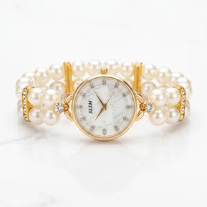 Double row faux pearl stretch quartz watch with diamond accents and marble dial for women