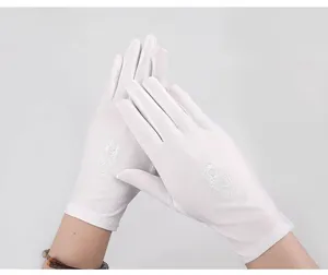 White sun protection gloves for women, thin elegant etiquette driving gloves with floral embroidery.