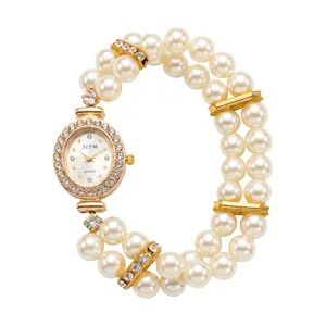 Women double-row faux pearl elastic quartz watch, elegant rhinestone bezel bracelet watch.