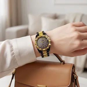 Detailed close-up of a women rhinestone quartz watch with black and gold steel strap.