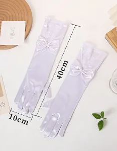 Long white satin bridal gloves with elegant lace and bow detailing, perfect for weddings.