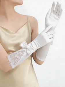 Elegant white satin bridal long gloves featuring delicate lace and bow for wedding dresses.