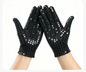 Close up detail of black sequin gloves for stage dance performance and party costume