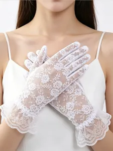 Detailed view of white floral lace sun protection gloves, breathable and elegant for bridal use.