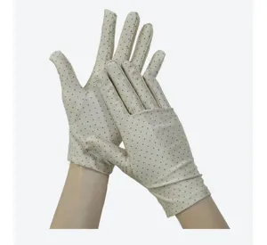 Detail view of women thin stretch polka dot sun protection gloves, ideal for driving.