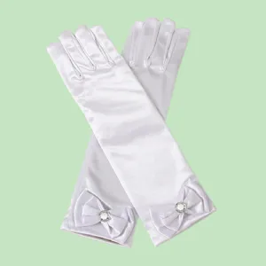 White satin princess gloves detail featuring elegant bows and sparkling rhinestones for kids.