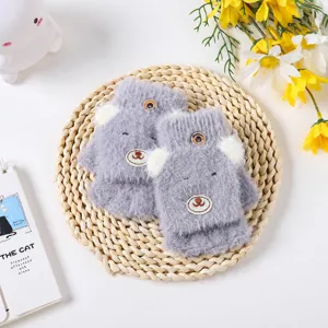Cute kids plush half-finger flip gloves, warm winter knitted mitten for boys and girls writing.