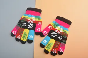 Colorful kids winter knit gloves with cute snowflake patterns and anti-slip grip dots.