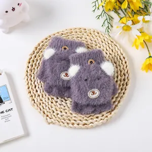 Children's plush half-finger flip gloves, cute bear design, warm winter knitwear details.