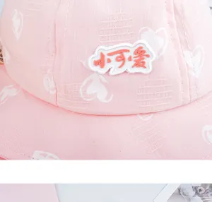 Pink infant bucket hat with white heart print and cute Chinese patch, cotton, spring