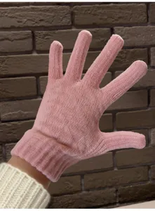 Pink knitted winter gloves detail showing the soft texture and ribbed cuff design.