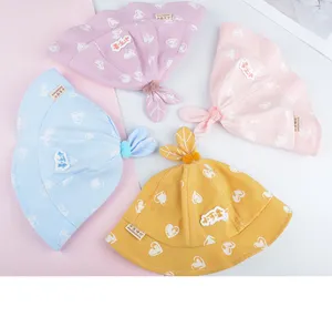 Cute baby bucket hat with heart pattern and bunny ears for toddlers spring autumn wear.