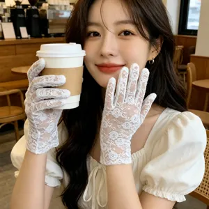 Elegant white lace sun protection gloves for women, ideal for summer daily parties and events.