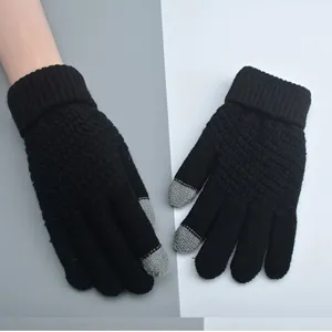 Black winter knitted touchscreen gloves detail view, warm wool fabric for cold weather.