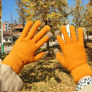 Warm winter knitted touchscreen gloves for women, orange five-finger thermal gloves for cold weather.