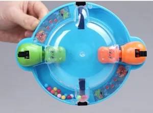 Mini jeu de plateau de table pour interaction familiale, combat de billes amusant et captivant.