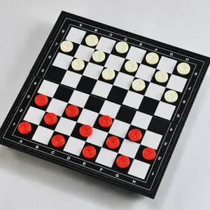 Detailed view of the mini international checkers chess board set with red and white pieces.