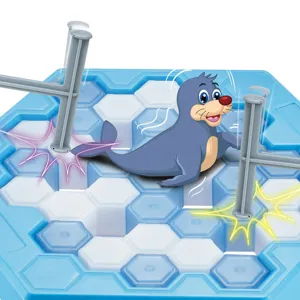 Ice breaking table game toy detail shot showing hexagonal ice blocks, hammers and cute seal.