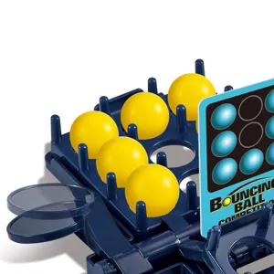 Jeu de table de balle rebondissante avec base de grille bleue et boules jaunes pour famille.