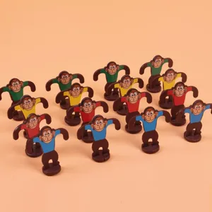 Set de juego de mesa de mono saltador para niños, juguete interactivo con figuras de colores.