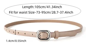 Detail of women thin leather belt with silver square buckle, elegant waist accessory.