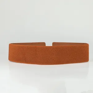 Close-up detail of the wide elastic waist belt, showing the stretchable textured fabric.