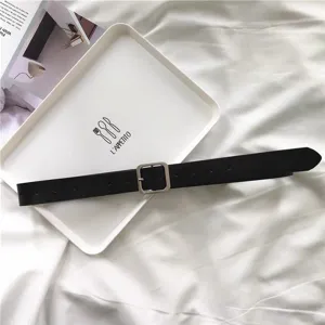 Minimalist black leather belt with a sleek square silver buckle for women everyday style