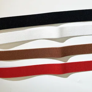 Detailed view of versatile elastic stretch belt straps in black, white, brown, and red colors.