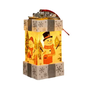 Christmas gift box luminous wind lamp with snowman and tree pattern for holiday decoration.