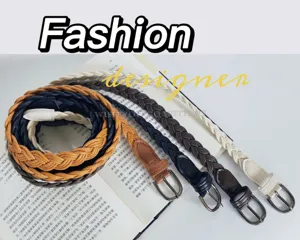 Close-up detail of women's braided leather belt with gunmetal pin buckle, vintage casual style.