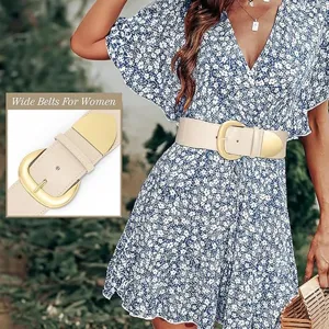 Detail view of wide belt for women featuring gold metal buckle, retro fashion waist cincher.